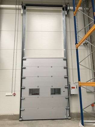 Brandtakskjutport med fönster OGS